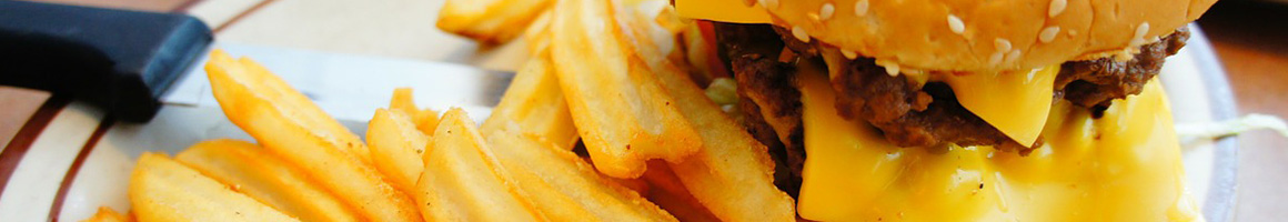 Eating Burger at Texas Burger restaurant in Patterson, CA.